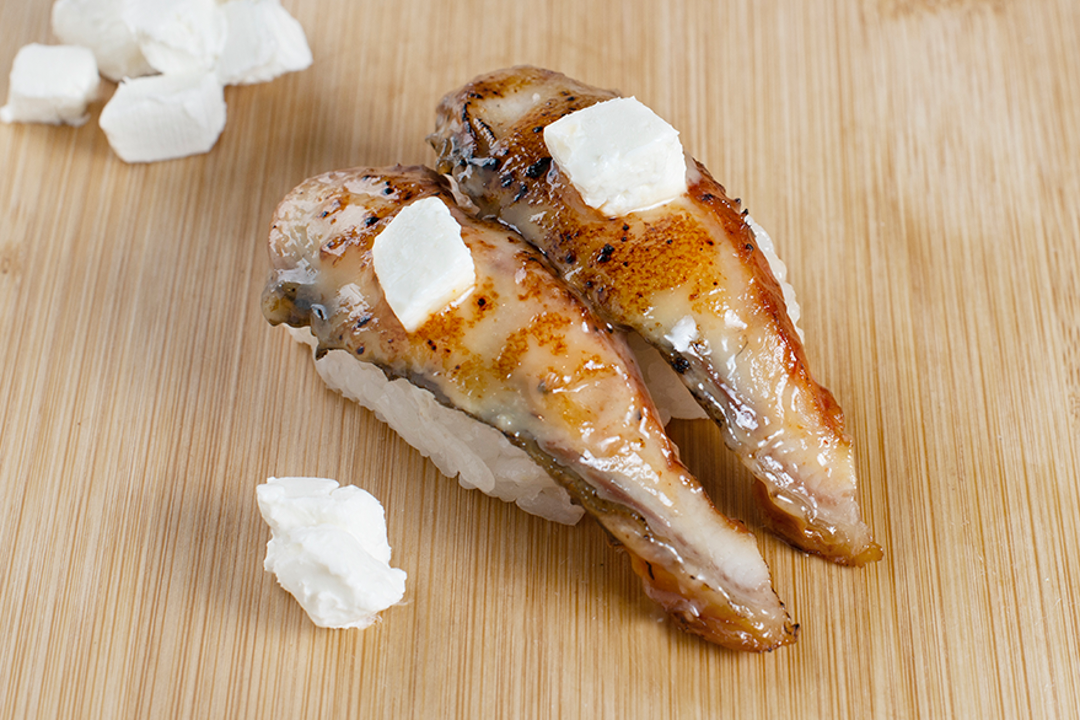 menu-2023-website-nigiri-seared-eel-with-miso-cream-cheese.png Seared Eel with Miso Cream Cheese - Image 1